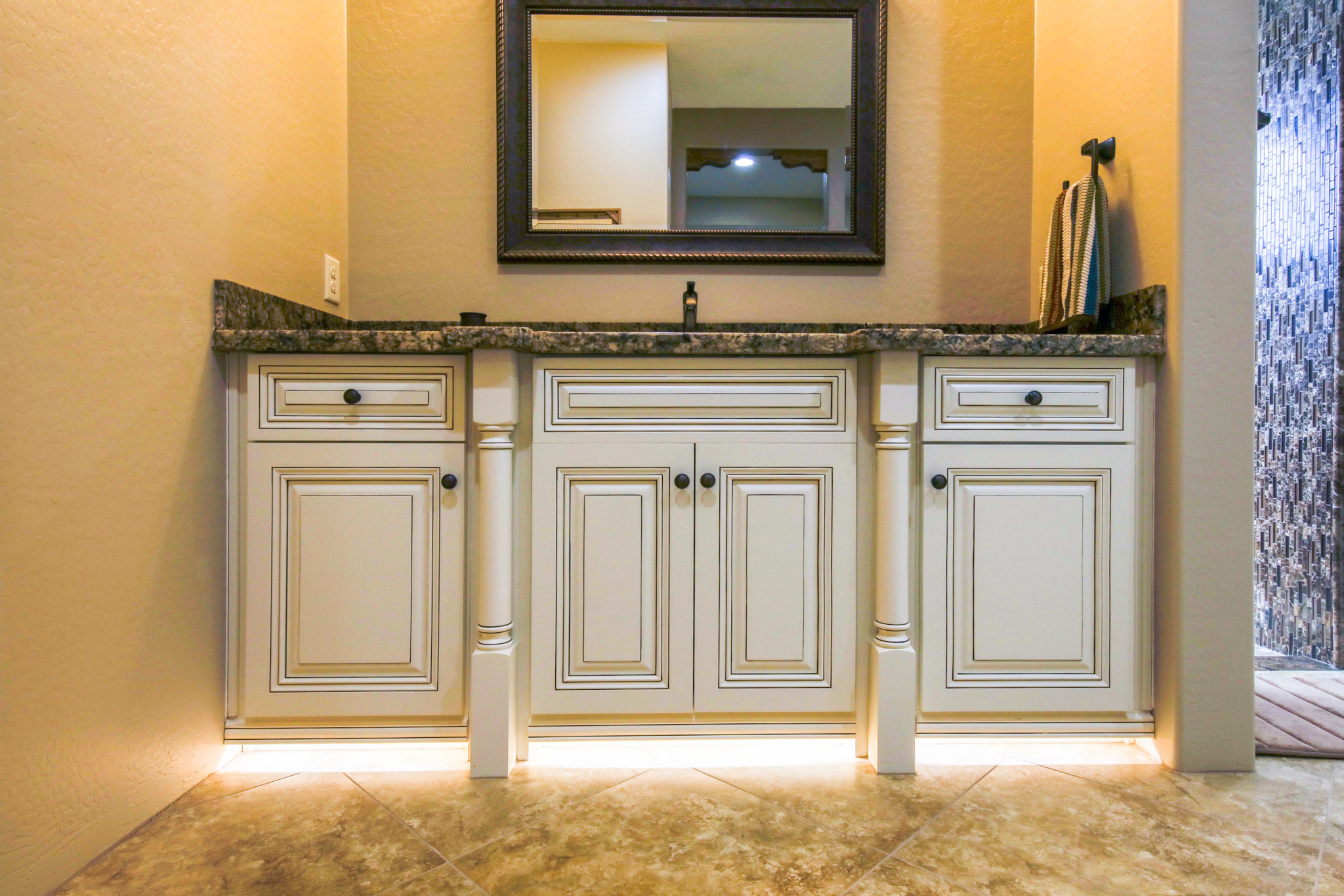 Master bathroom remodel in Phoenix Valley with custom cabinetry by Maverick Kitchens